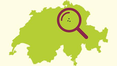 Umriss der Schweiz mit einer Lupe